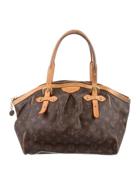 donna con la louis vuitton tivoli gm|Louis Vuitton Monogram Tivoli GM .